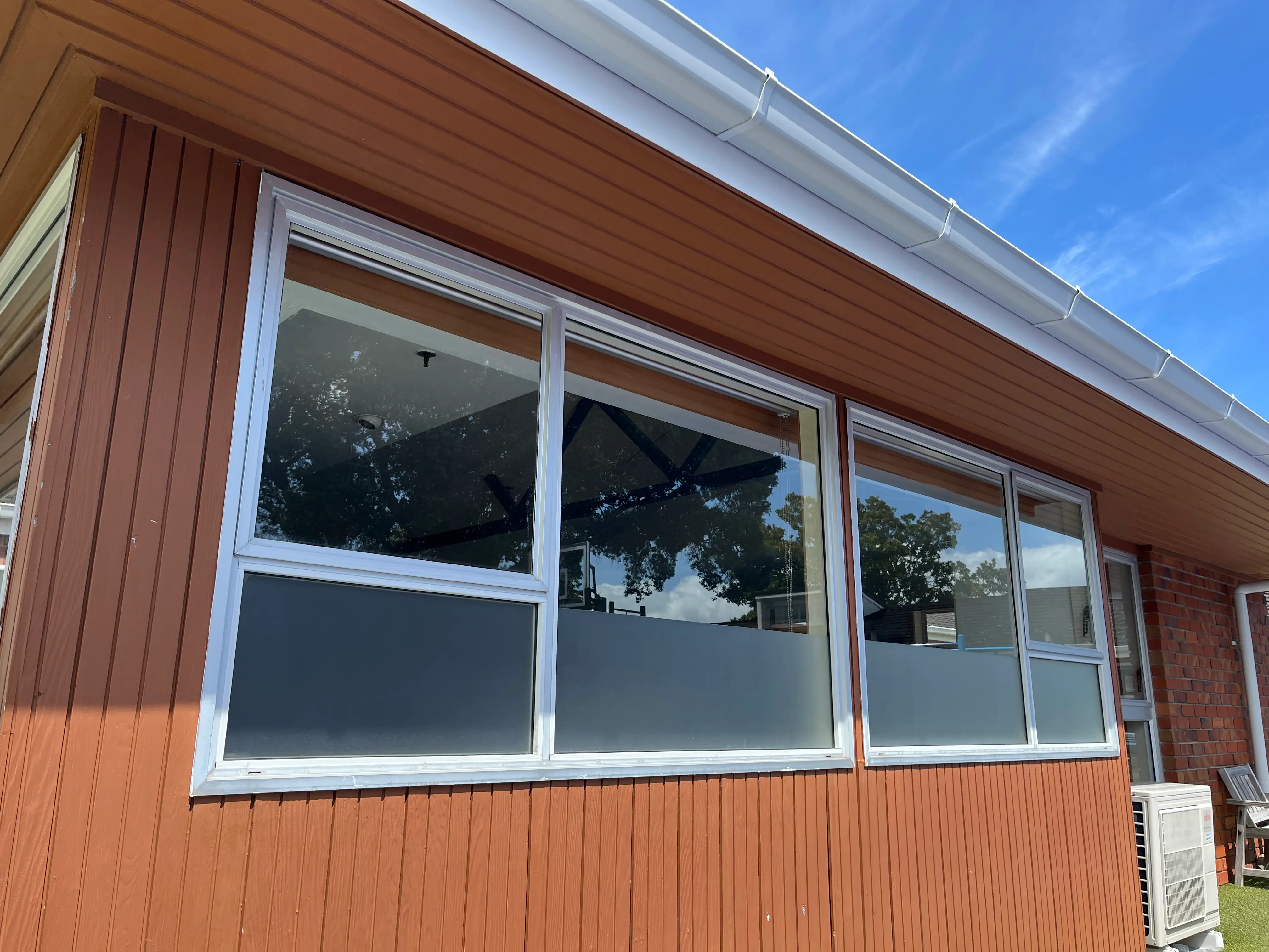 Window film reducing heat glare UV and fading in St Marys Bay